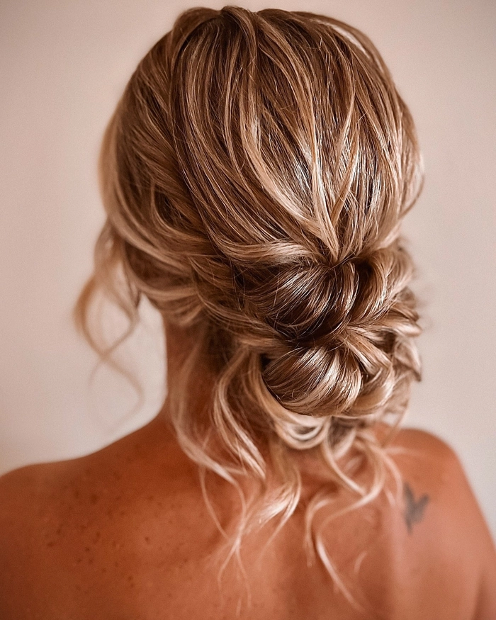 Simple low bun hairstyle for a holiday family gathering