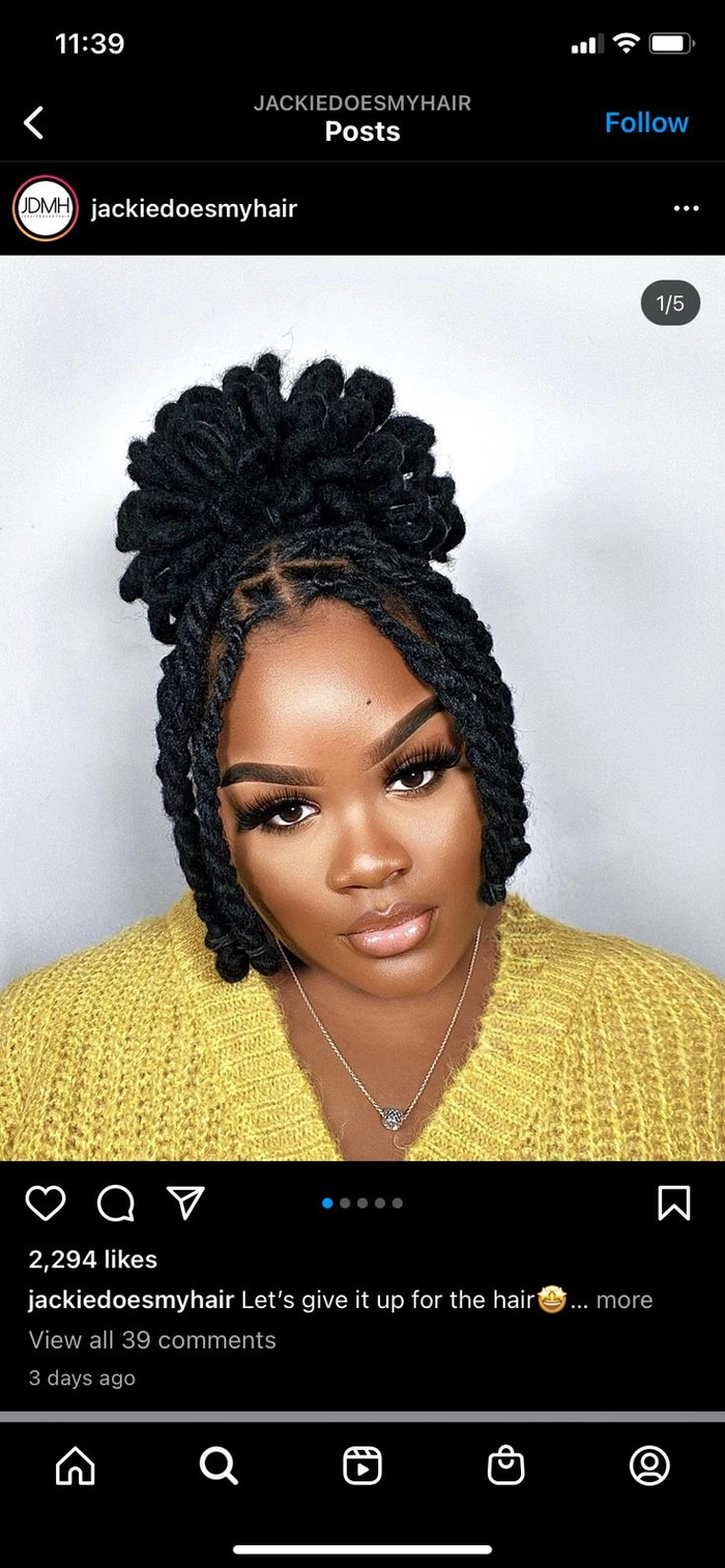 Festive locs styled with winter accessories for holiday events