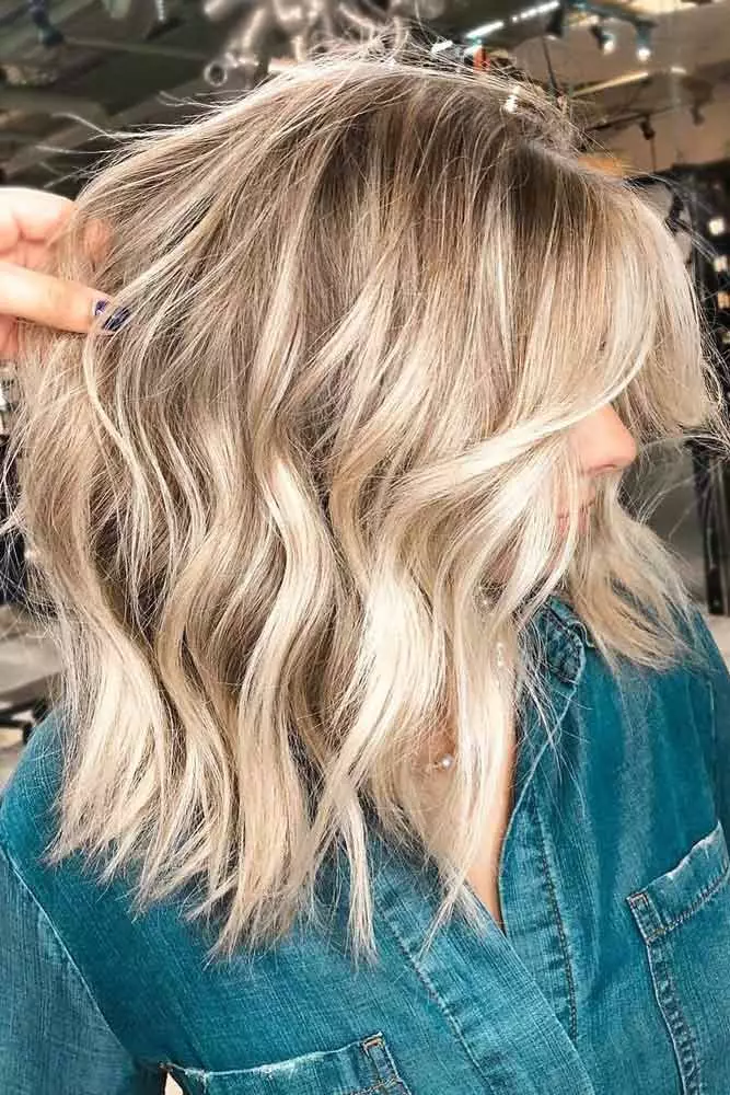 Medium length holiday waves styled for thick hair with festive volume