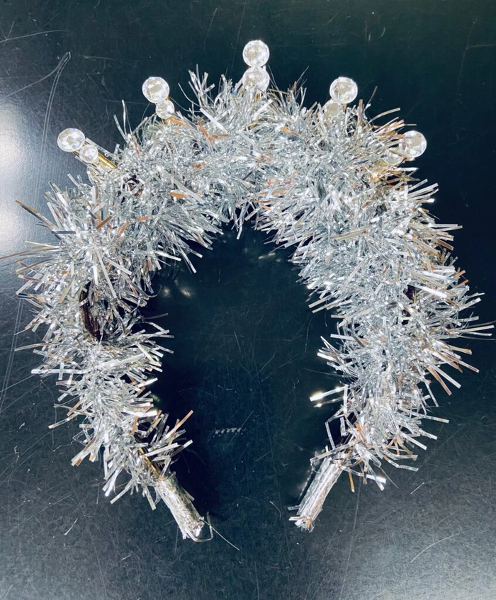 Sparkly hair clips on a short pixie cut for New Year's Eve
