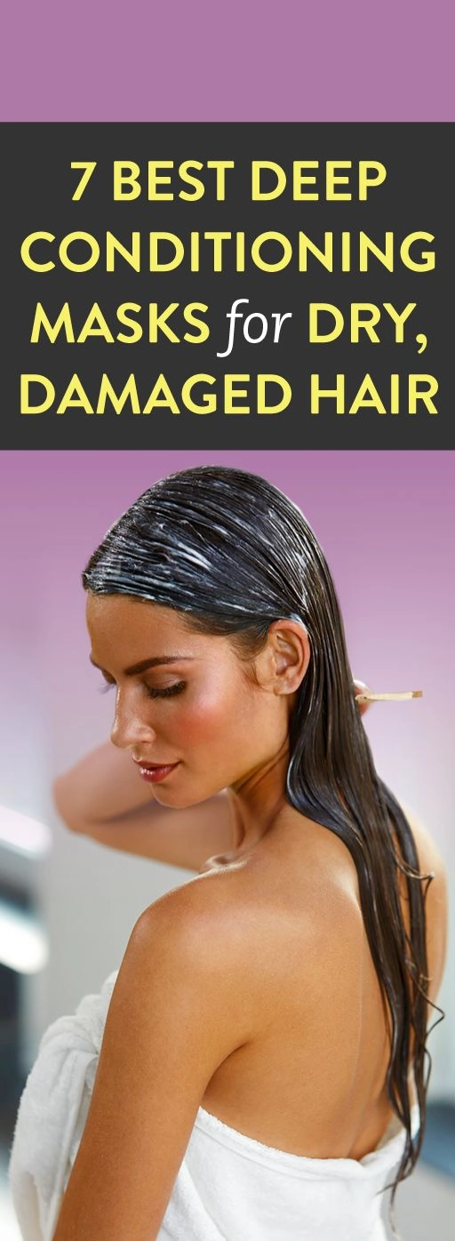 A woman applying a deep conditioning mask to her damaged holiday hair
