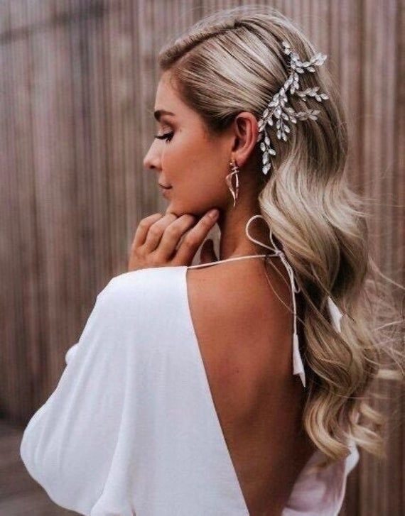 Elegant rhinestone hair comb positioning for holiday gala hairstyles Step-by-step guide for rhinestone hair comb placement at formal galas