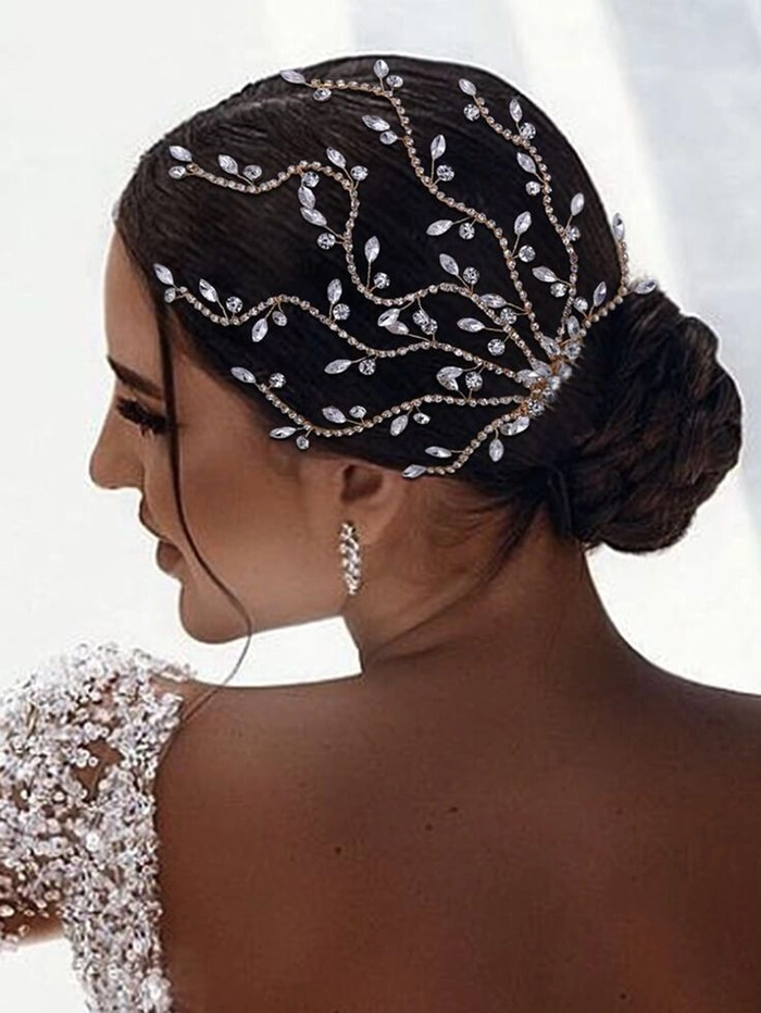 Styling a rhinestone hair comb into an updo for festive holiday party glamour Proper placement of a rhinestone hair comb for an elegant formal gala hairstyle