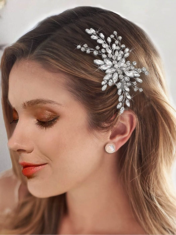 Woman attending a New Year's Eve gala with a glittering hair clip placed elegantly in her updo