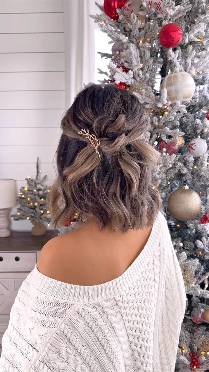 Styling wax being applied to define short holiday haircut with textured waves