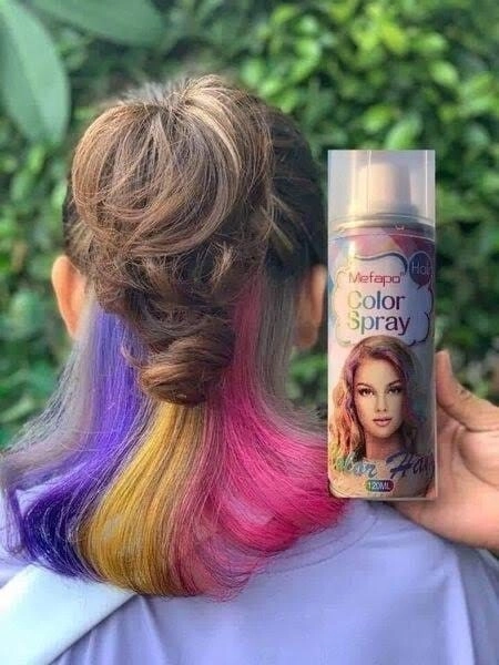 Woman with vibrant temporary color spray hairstyle for festive weekend celebration