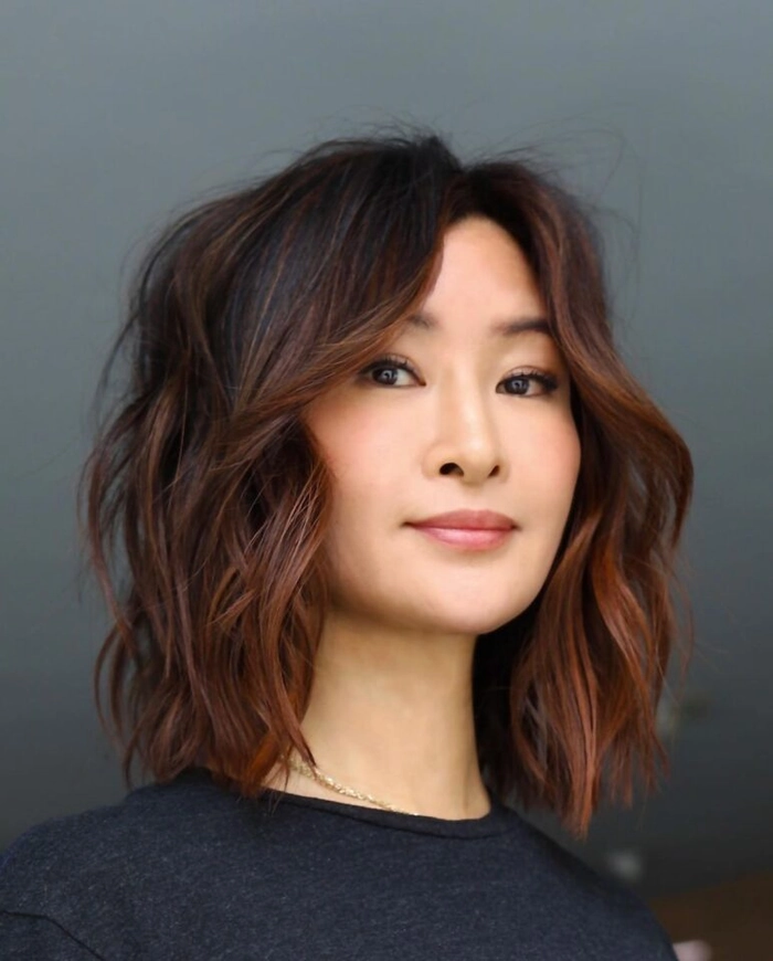 Textured lob looks for friendsgiving parties, a stylish holiday hairstyle with voluminous waves
