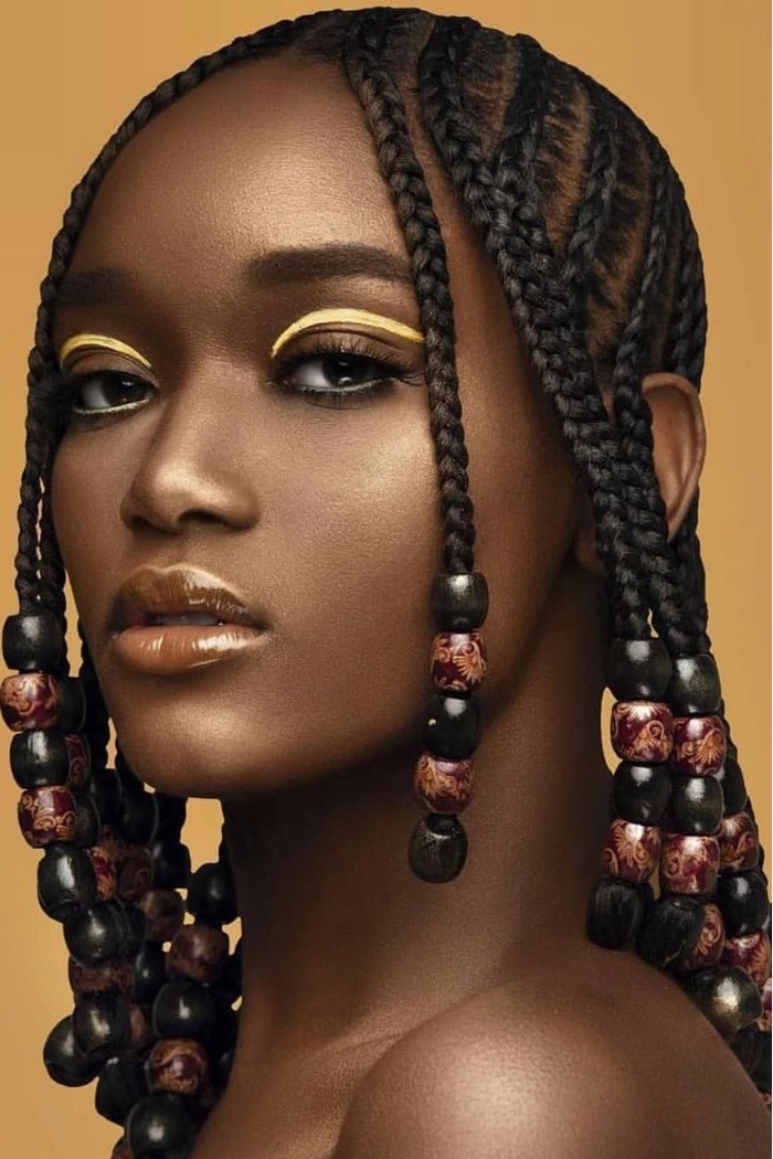 Woman with traditional braided hairstyle for cultural holiday festival