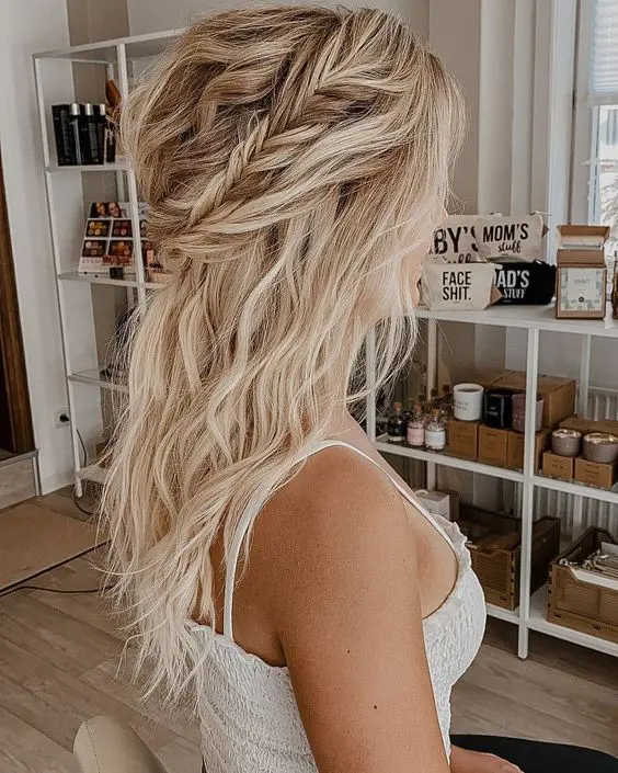 Twisted Halo Updo – Romantic Winter Date Hairstyle Idea Elegant twisted halo updo with soft curls for a romantic winter date night