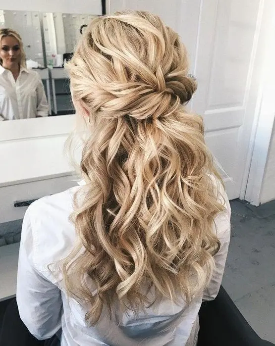 Romantic twisted halo updo for winter dates Twisted halo updo hairstyle with winter accessories for a romantic date