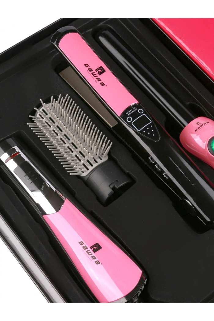 Woman selecting curling iron and clips from at home party hair styling kit