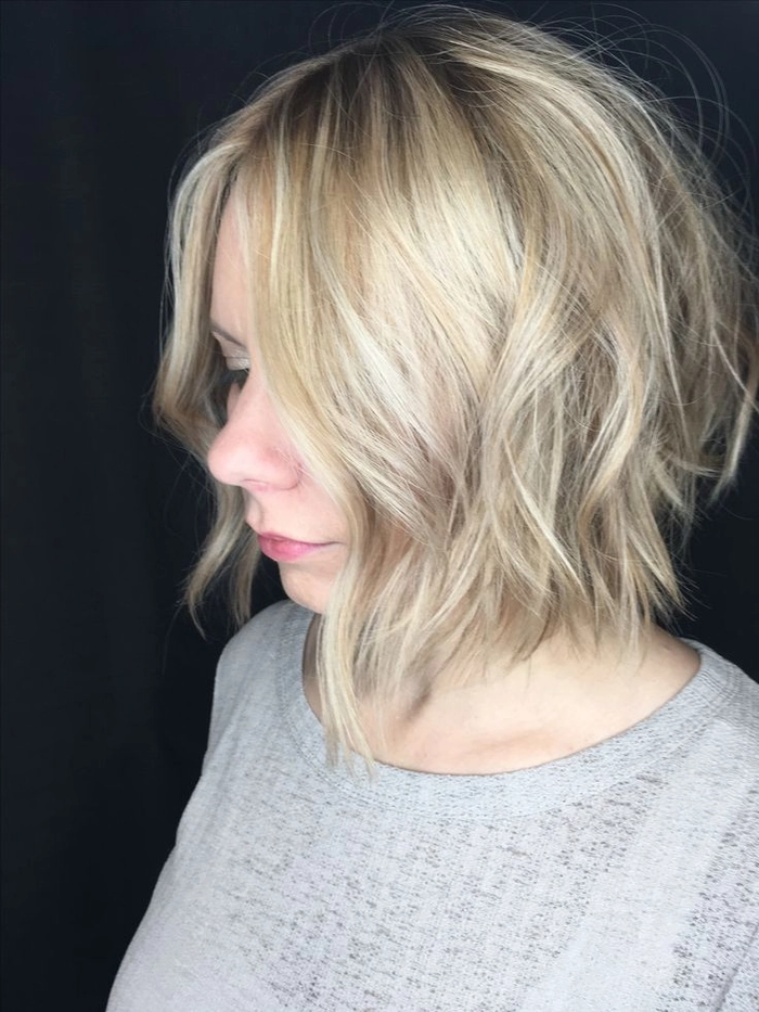 Autumn birthday party hairstyle featuring a textured lob with warm tones