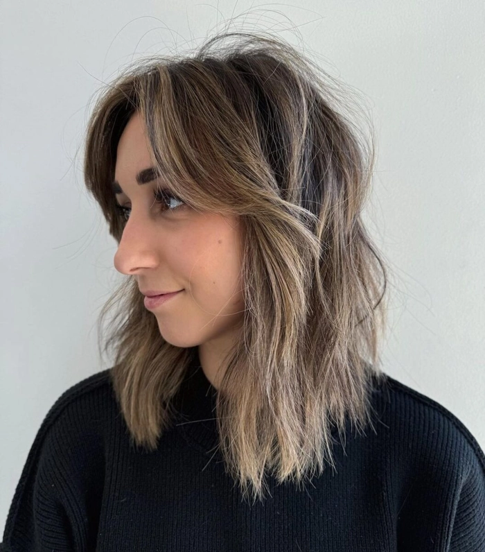 Textured lob hairstyle with autumn leaves background for birthday party
