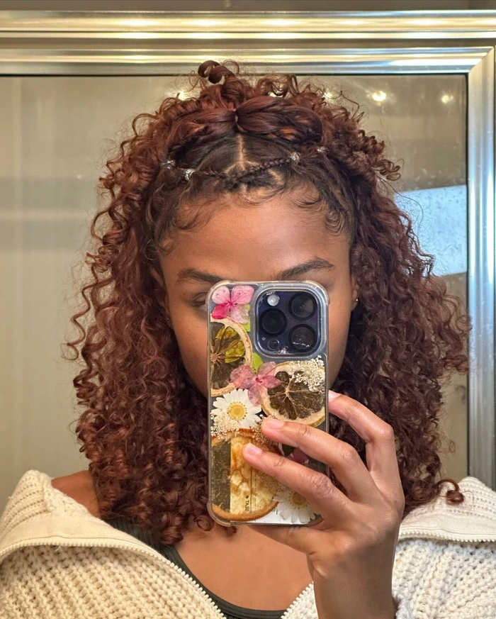 Soft birthday curls styled for damaged hair at a festive party event