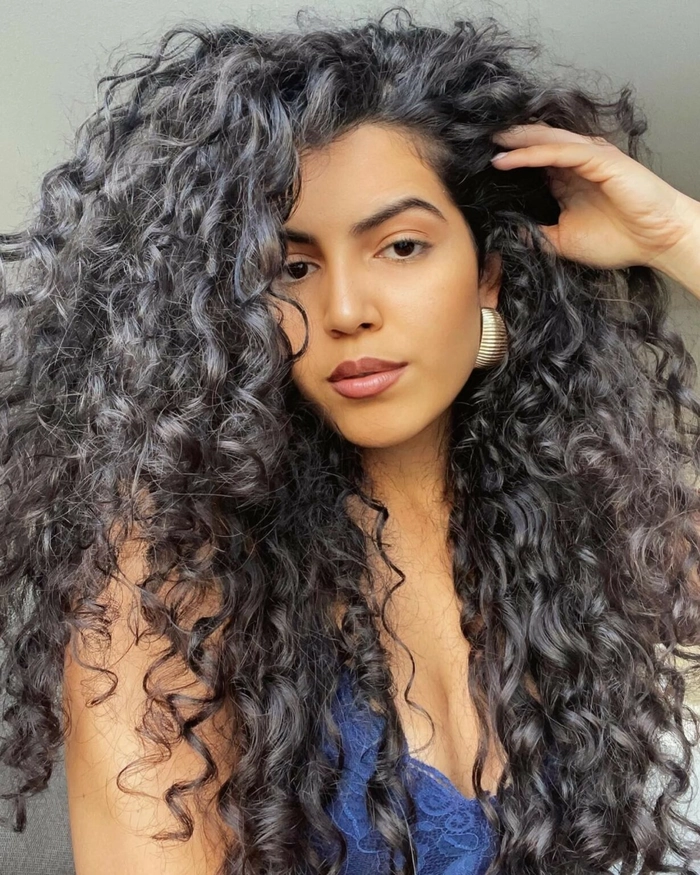 Celebrate your birthday with gentle curls designed for damaged hair at a party hairstyle event