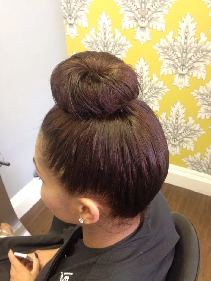 High Sleek Top Knots Birthday Party Hairstyle Elegant birthday party hairstyle featuring high sleek top knots with smooth finish