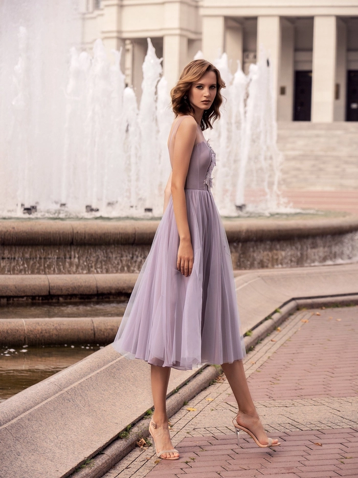 Elegant cocktail party braided halo hairstyle with formal dress