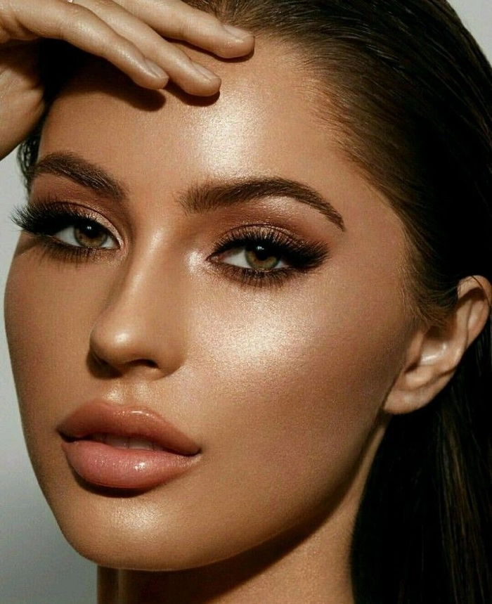 Dark brunette glossy clubbing hairstyle with voluminous waves