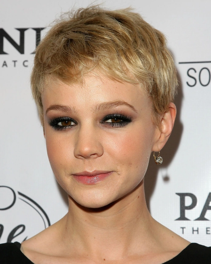 Bold clubbing hairstyle for short pixie cuts at a party Short pixie cut with edgy texture and shimmering accents perfect for clubbing nights