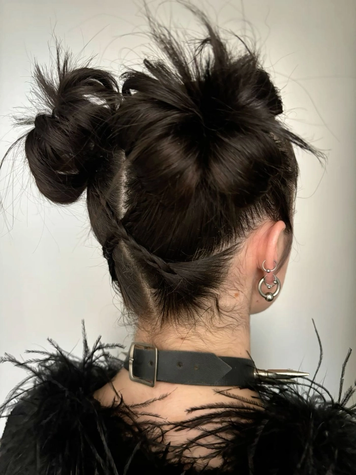 Edgy clubbing space buns with bold accessories for a party look
