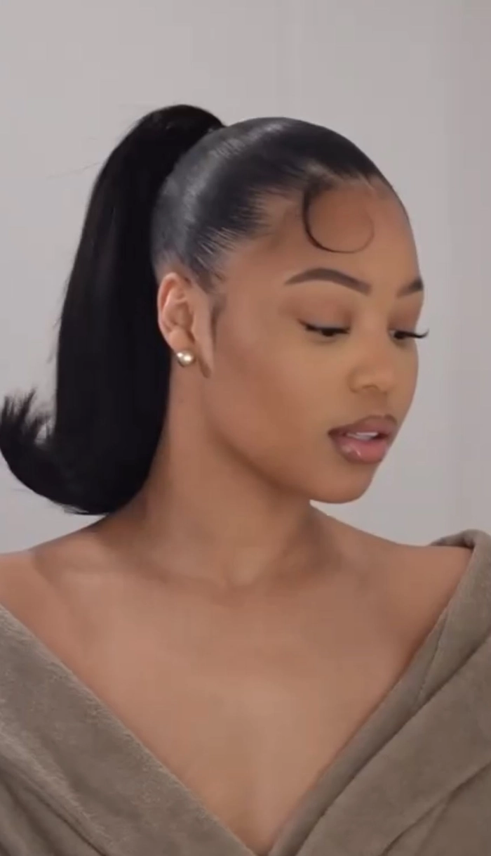 Sleek high ponytail hairstyle for cocktail attire party look.