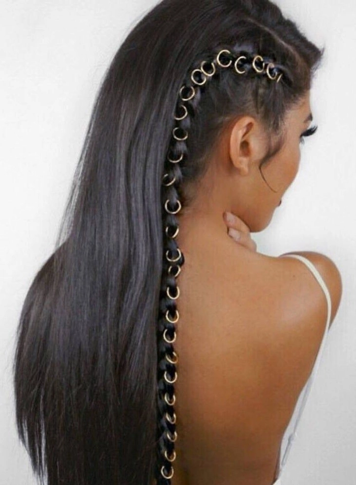 Elegant cocktail hairstyle with a sparkling gold hair cuff Gold hair cuff adorning a chic cocktail party updo