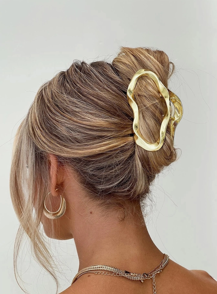 Gold hair cuff styling tips for chic party updos and half-up hairstyles Elegant cocktail party hairstyle featuring gold hair cuffs for a glamorous look