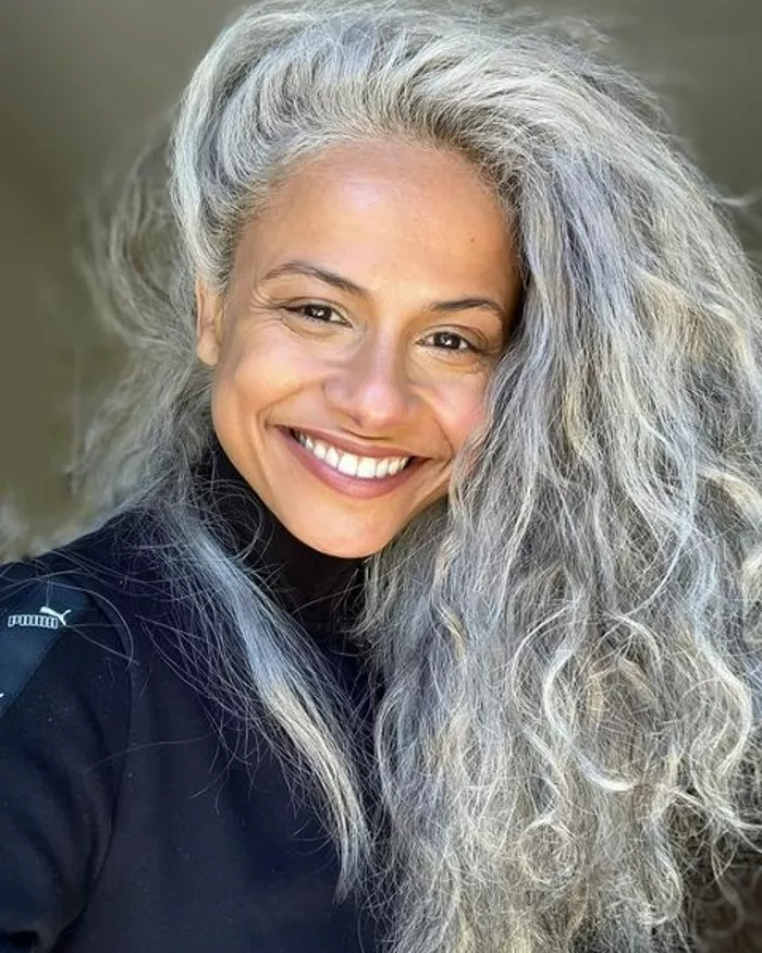 Silver grey cocktail party hairstyle with elegant waves and sparkling accessories