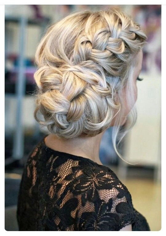 Styled updo using hair extensions perfect for party hairstyles Elegant cocktail party updo with hair extensions for a glamorous look