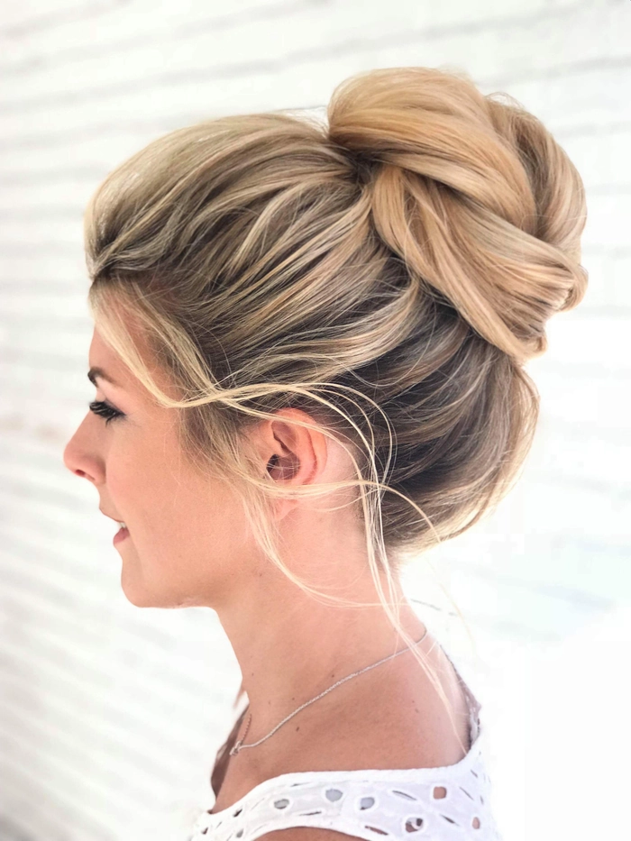 Elegant evening bun hairstyle for very long hair, perfect for a party or formal event