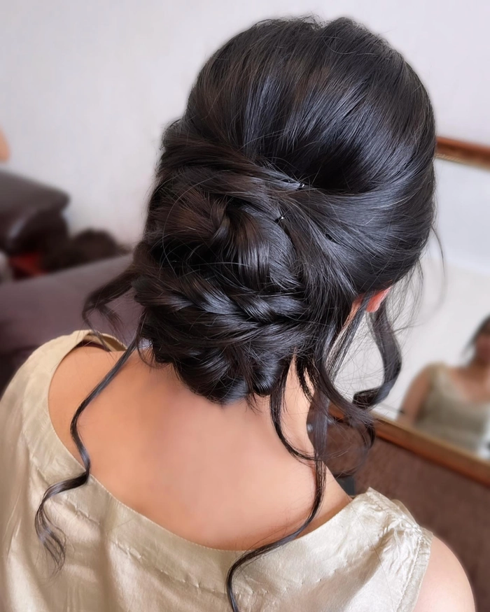 Elegant evening bun hairstyle for very long hair, perfect for parties
