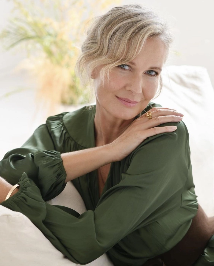 Elegant Evening Updo for Women Over Forty - Party Hairstyle Elegant silver-streaked updo with soft tendrils for a sophisticated party look