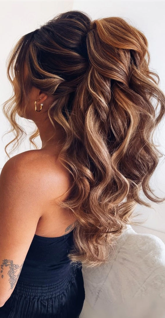 Romantic Half Up Engagement Party Hairstyle with Soft Waves Romantic half up hairstyle for engagement party with soft waves and delicate accessories