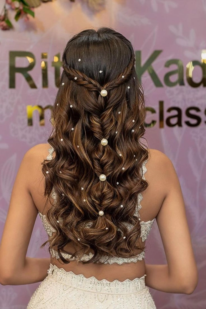 Engagement Party Romantic Half Up Hairstyle - Elegant Waves and Floral Accents Romantic half-up hairstyle for engagement party with soft waves and delicate accessories