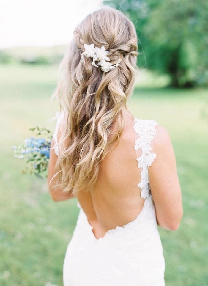 Elegant engagement party half-up style with intricate twists and subtle volume Romantic half-up hairstyle with soft curls and delicate floral pins for an engagement party
