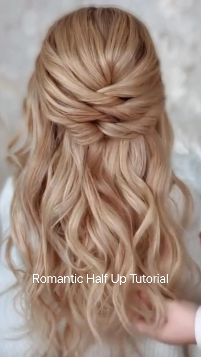 Engagement Party Half Up Romantic Hairstyle Image Romantic half up engagement party hairstyle with soft waves and delicate accessories