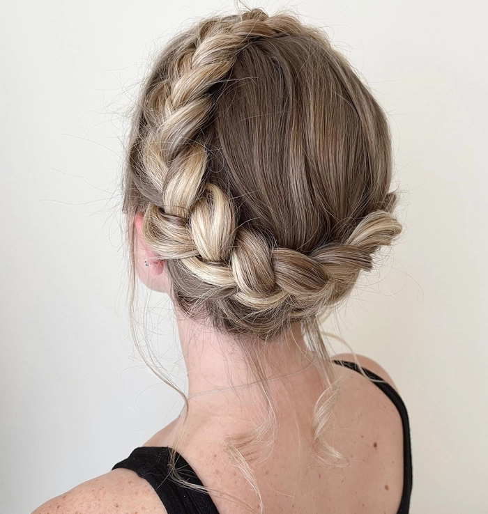 Romantic dinner hairstyle: evening milkmaid braids for a party look Elegant milkmaid braid hairstyle for a romantic evening dinner party