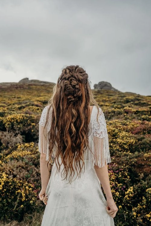 Festival hairstyle complementing flowy bohemian maxi dress for parties