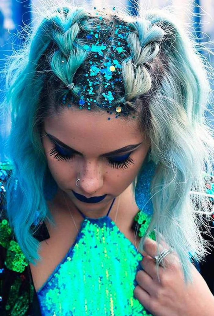 Festival braids with hidden rainbow underlights creating a playful party hairstyle