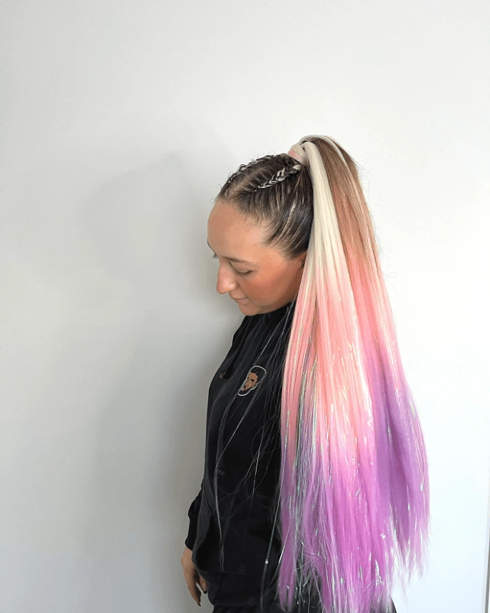 Festival braids with metallic thread for a party hairstyle Festival braids with shiny metallic thread woven throughout