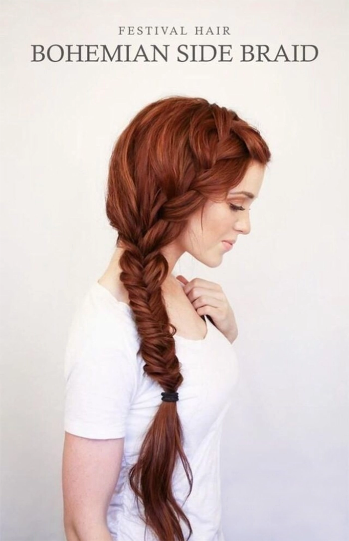 Festival fishtail braids cascading with bohemian flowers and ribbons