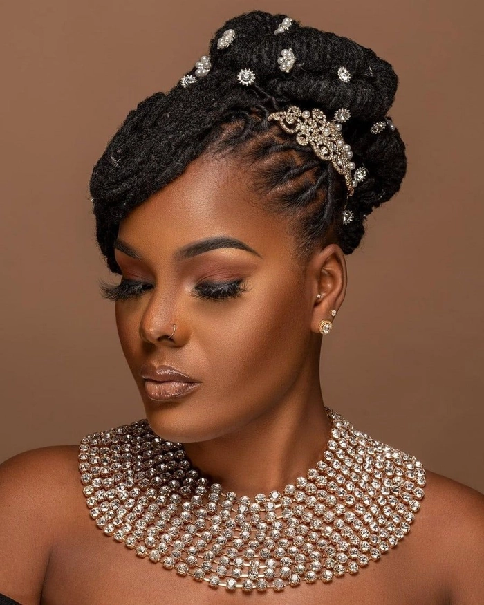 Festival hairstyle for locs and dreadlocks featuring bold accessories for a fun event Festival-ready locs with colorful beads and floral accents for a vibrant party look