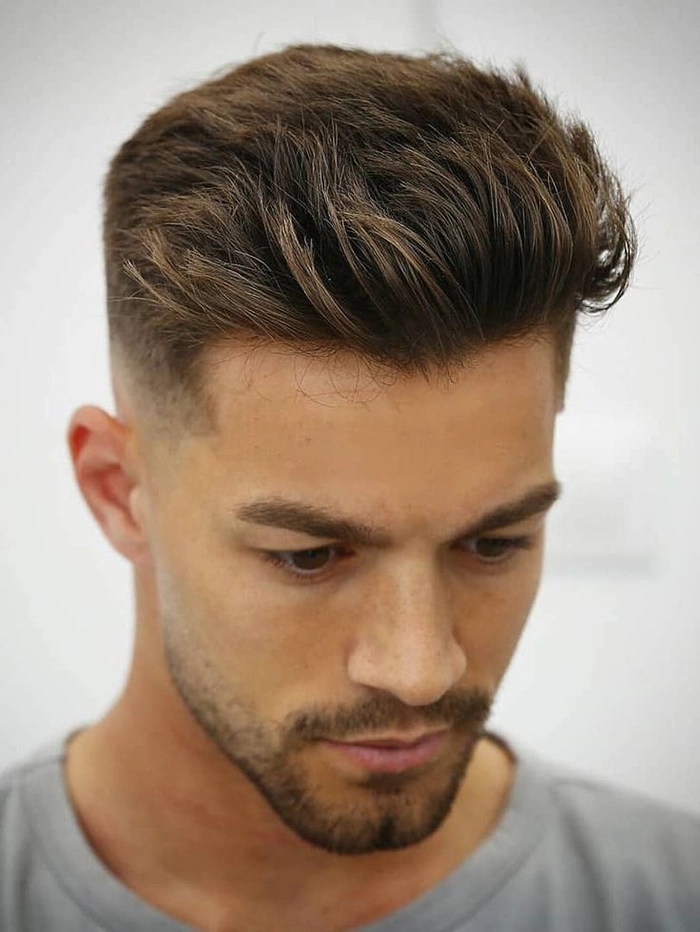 Formal party hairstyle for teenage boys, image 5 Teenage boy in suit with neat side-swept formal hairstyle for a party