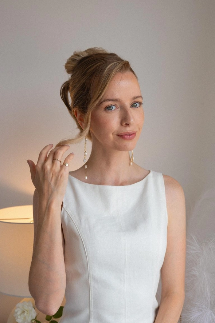French twist hairstyle for formal party gowns, image 6 from the party hairstyles collection. Elegant party french twist updo complementing a formal gown, showing detailed twists and volume.