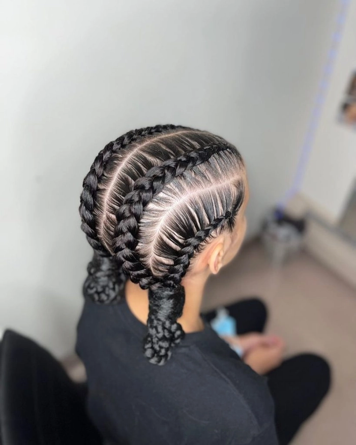 Gala braids styled in thick heavy hair for an elegant party look