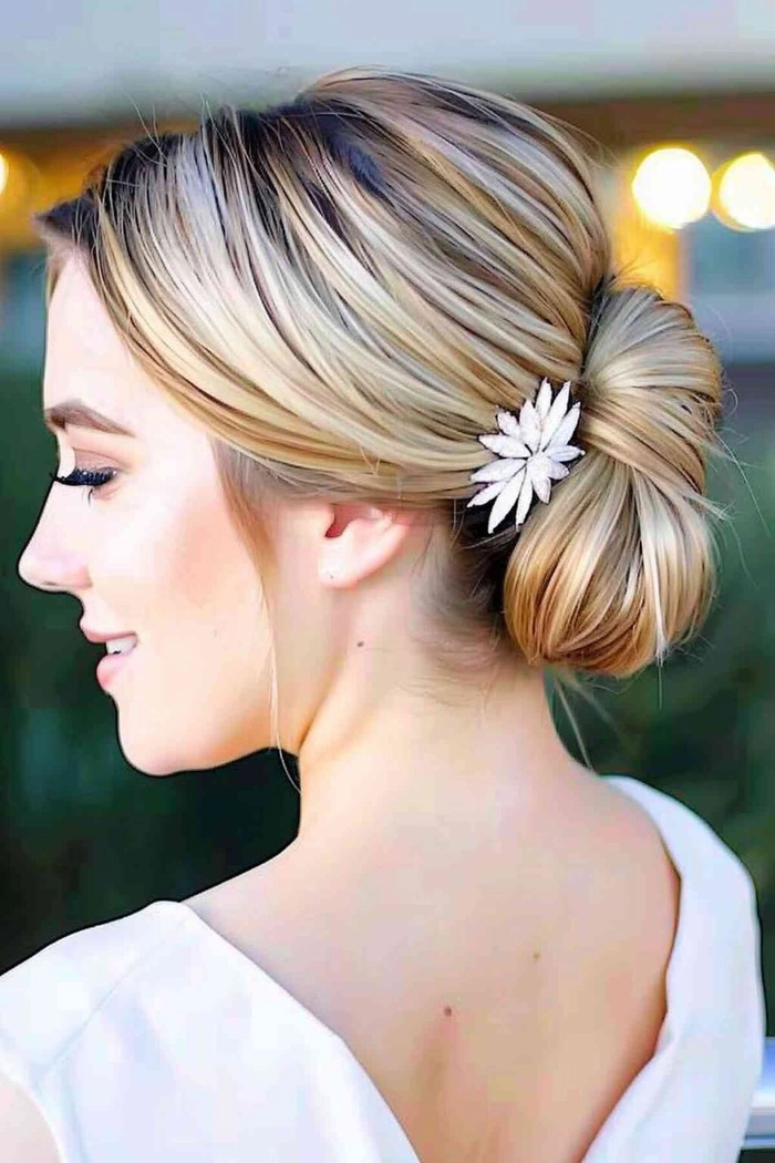 Glamorous gala hairstyle for freshly highlighted blonde hair