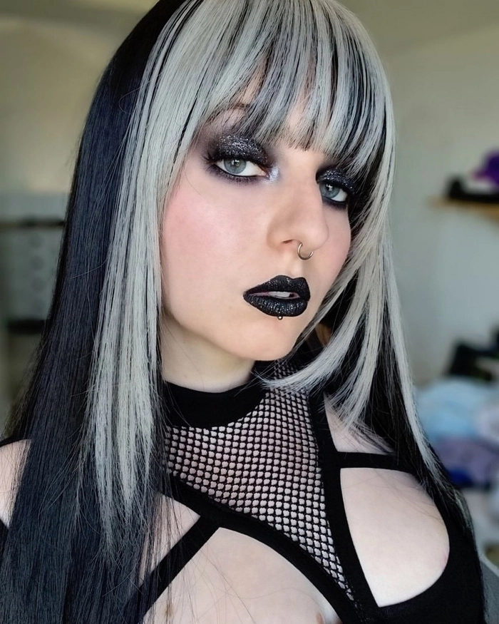Elegant gothic prom updo accented with black lace and silver skull accessories