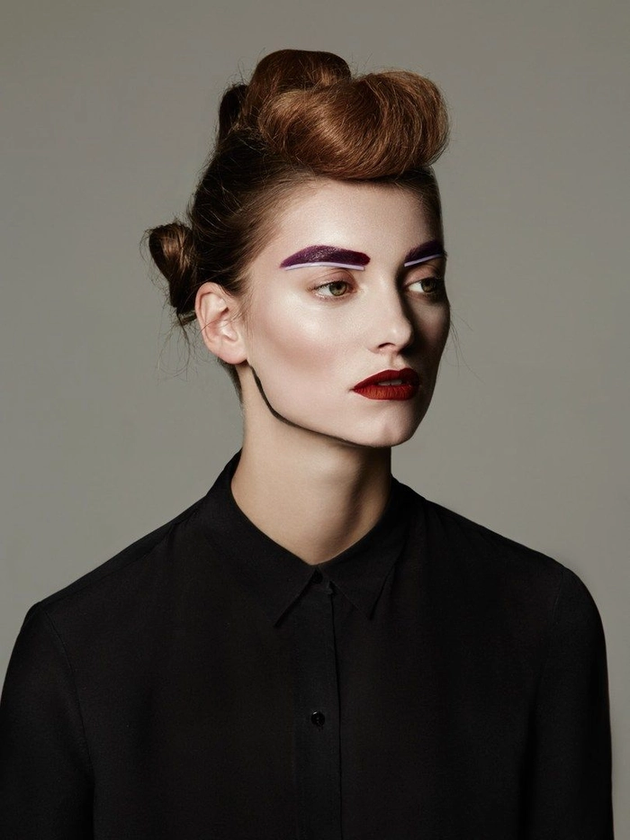 Edgy gothic prom hairstyle with dark velvet bow and silver choker accessory