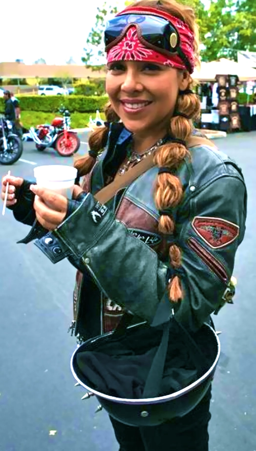 Helmet-Friendly Party Hair for Motorcycle Events: Style and Safety Combined A motorcycle rider with a party hairstyle designed to fit under a helmet
