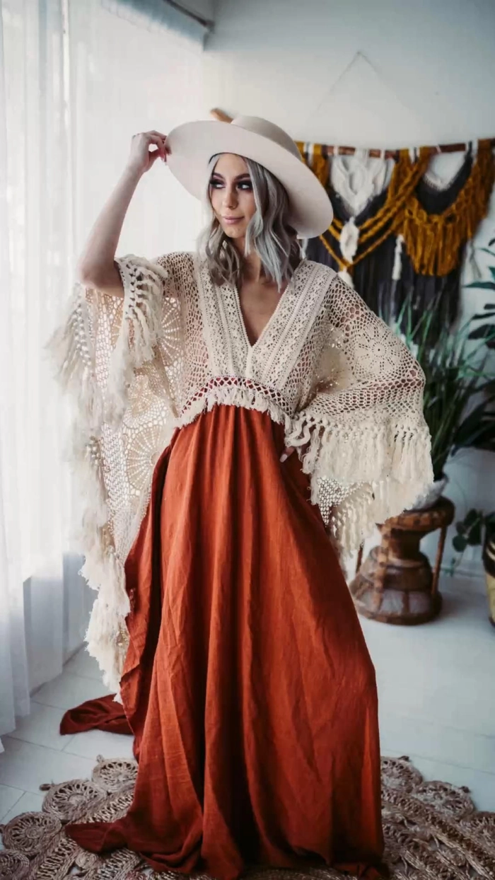 Festival-ready bohemian hairstyle complementing a flowy maxi dress under vibrant string lights